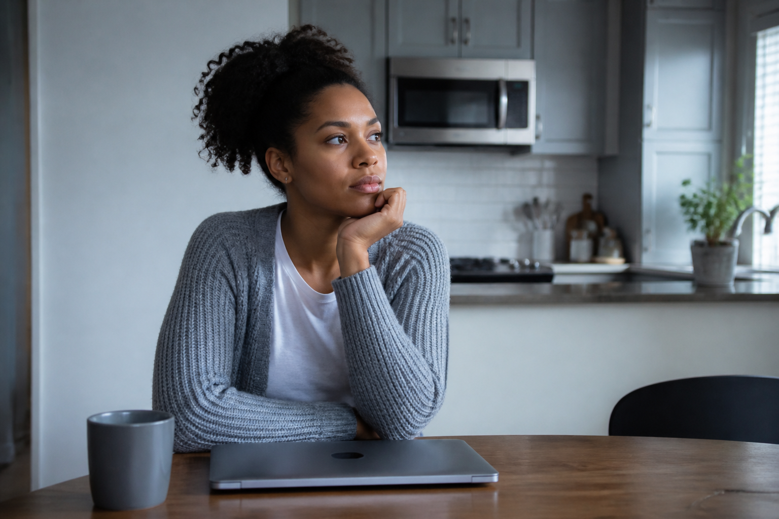 Pensive, calm woman — not sad, not crying